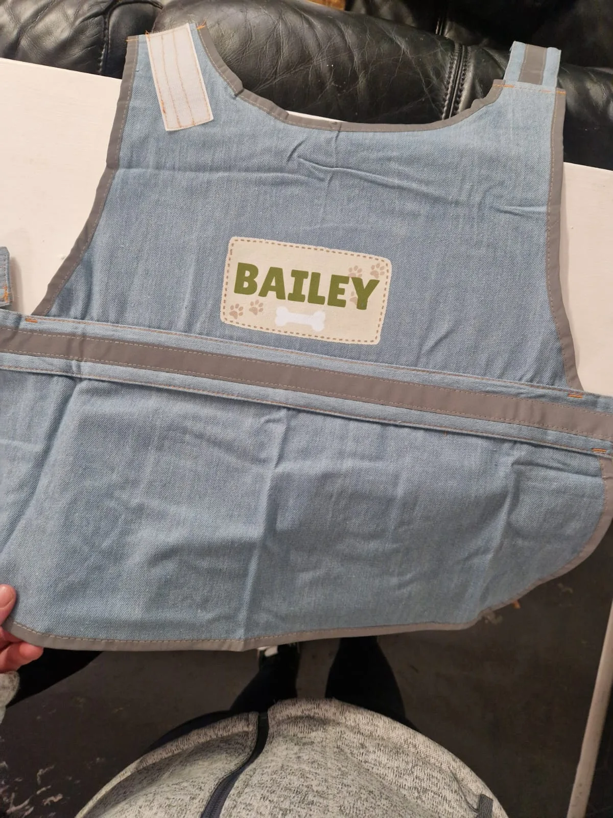 Grey apron with personalised Bailey name patch