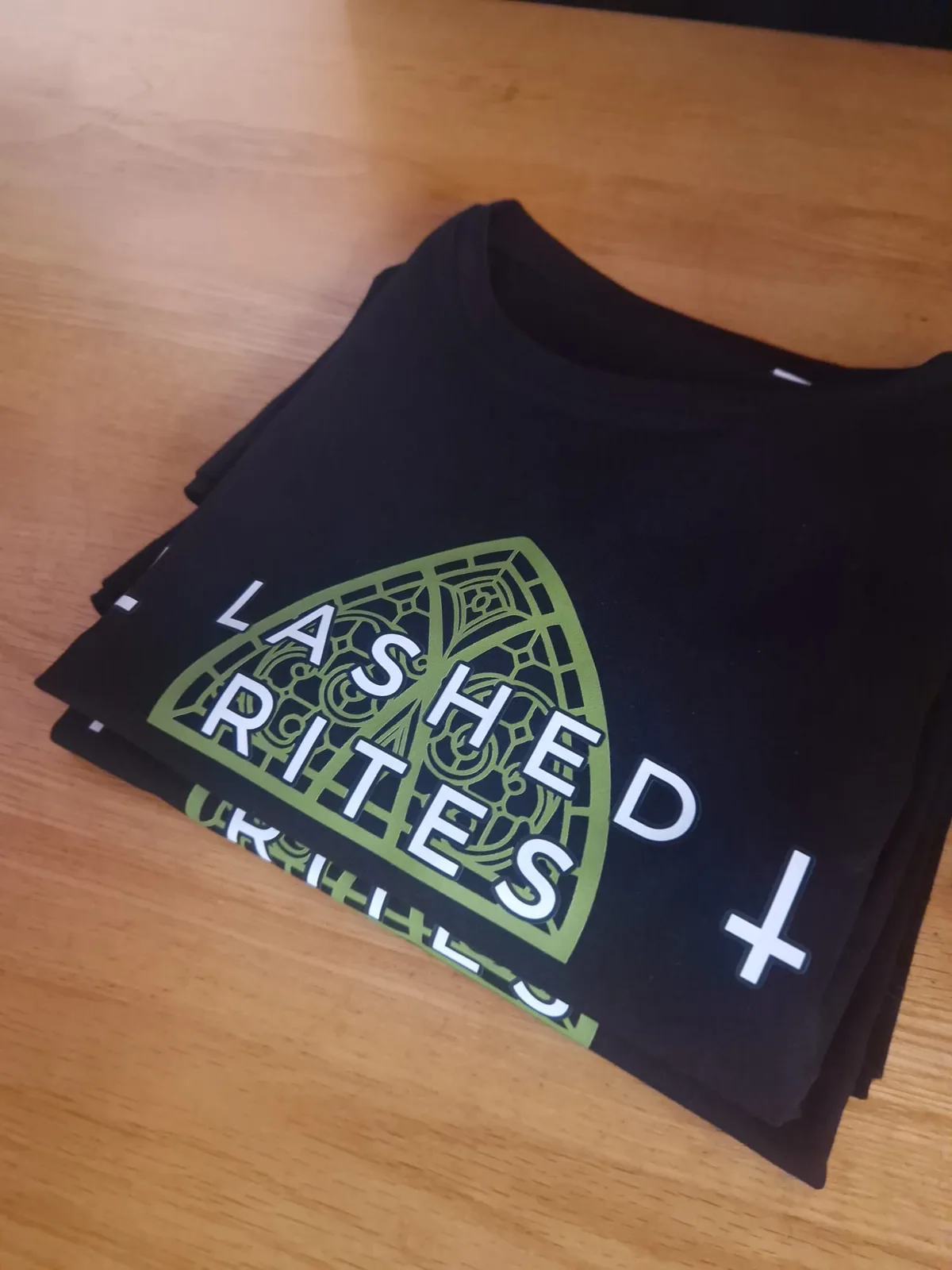 Black t-shirts with Lashed Rites lash artistry branding