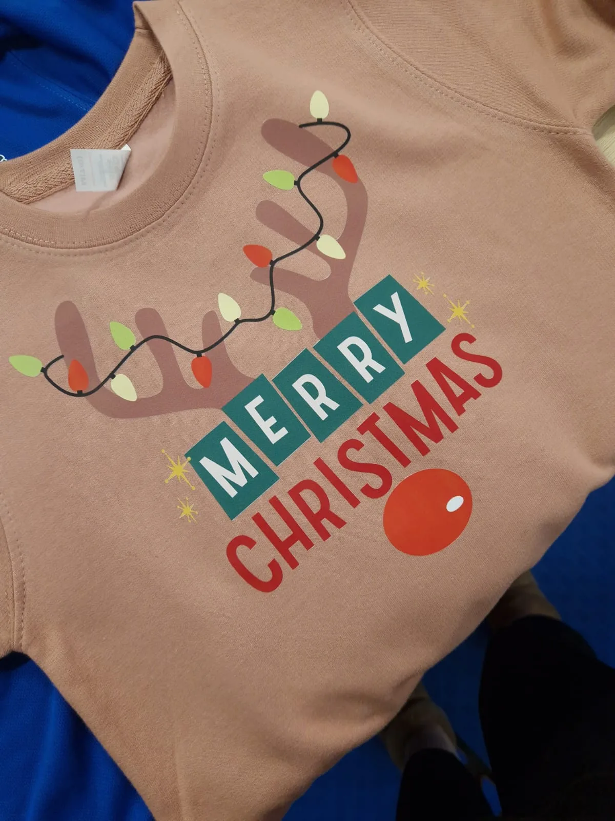 Pink t-shirt with Merry Christmas reindeer design