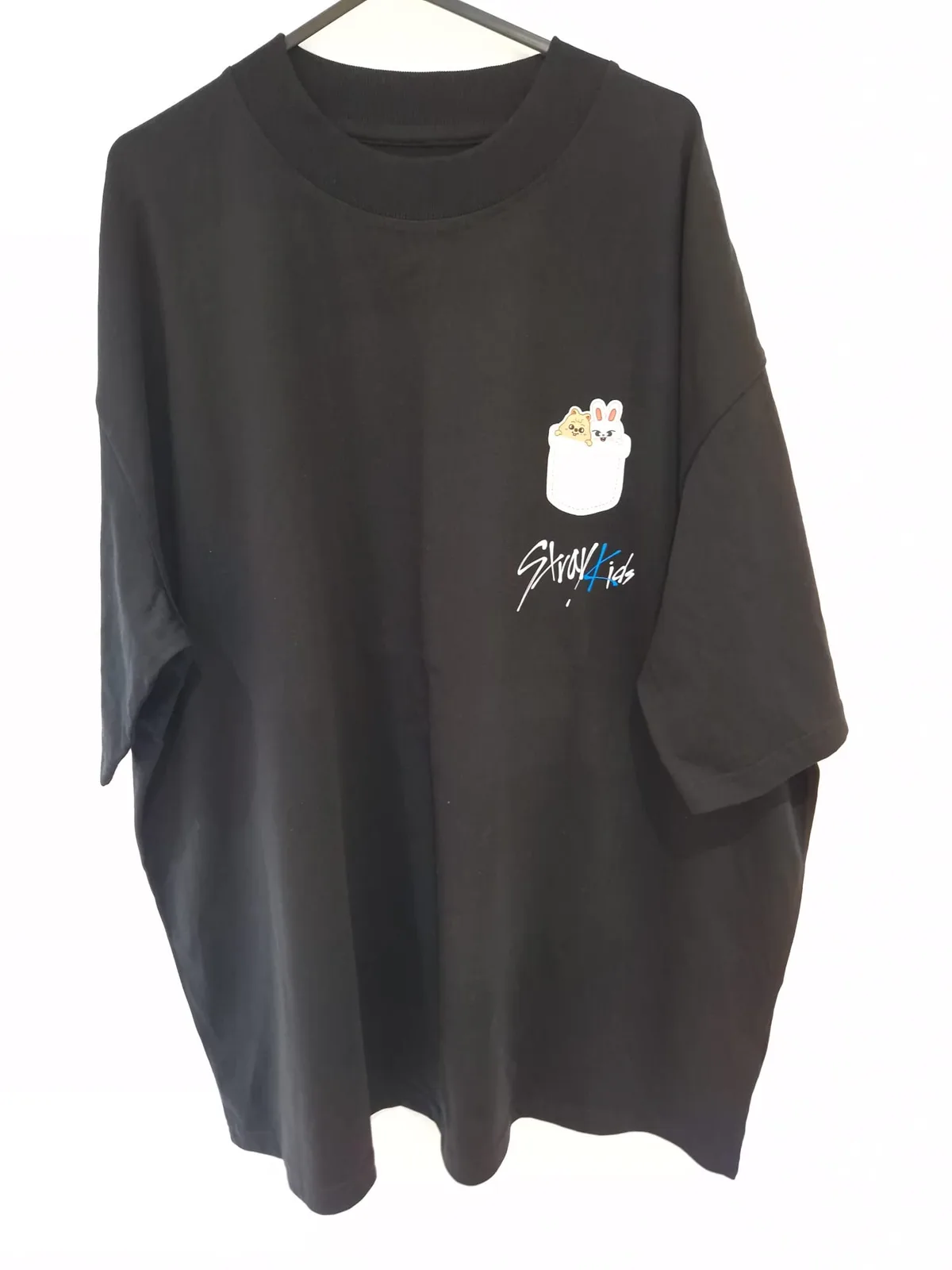 Black t-shirt with illustrated snack chest graphic